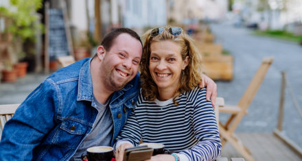 Young man and woman smiling